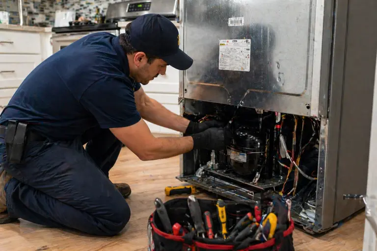 A technician doing Refrigerator Repair in Salem OR